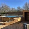 réalisation d'une terrasse en poin avec escalier Pin classe 4 autour d’une piscine hors‑sol dans le Pays basque
