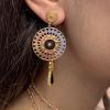 Boucles d’oreilles uniques, dessinées sur la Côte d’Opale et fabriquées en France – un bijou graphique et lumineux qui attire tous les regards.