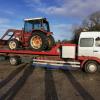 Transport d'un tracteur agricole sur plateau
