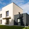 Projet de surélévation et d’agrandissement dans l’Ain, Oyonnax avec une solution adaptée aux contraintes du terrain et du bâti existant.