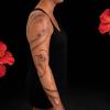 Tatouage polynésien sur le bras pour une femme — motifs des îles réalisés chez Kanea Tattoo & Beauty à Toulon.