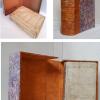 Coffret faux livre en cuir et papier ancien pour la protection d'un volume 16ème en plein parchemin.