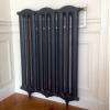 Radiateur en fonte de marque Sulzer réstauré et installé par la société Fontaine