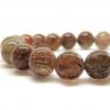 Bracelet Super Seven Quartz rutile noir, doré et cuivré