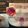 Tatouage lettres tribal rose bas du dos