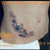tatouage volutes,papillon et fleurs , tattoo personnalisé, création unique, Loodo et Iza, a2tattoo tatoueur vendée