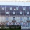 Bâche décorative pour un bâtiment en chantier, fabriquée et installée par Applicover, à Bréval (78)
