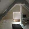 Aménagement de comble : isolation, velux, peinture, parquet, parois vitrée, porte coulissante, escalier. 
