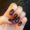 Noir pailleté violet