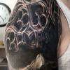 skull rosace par stephane bueno studio black corner tattoo valence