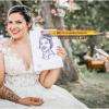 La mariée vient de se faire dessiner en direct, très jolie.