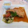 Plat : carré de porc cuit à l'étouffée, embeurrée de chou et crumble de courgettes