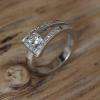 Bague "Loop 1". Or gris et diamants.