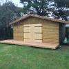 Abris de jardin de25m2 en ossature bois, bardage demi-rond, terrasse en douglas.