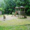 Petit parc de jeux pour enfants situé à l'entrée du Domaine