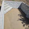Construction maçonnerie piscine avec un escalier