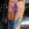 Plume watercolor réalisée chez excess tattoo montpellier