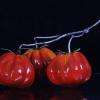 Trois tomates : céramique et métal