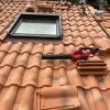 Réfection toiture tuile avec remplacement d’un velux 