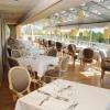 La sallle de restaurant donnant sur le golf.