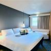 Chambre triple de l'Hôtel Ibis Nantes La Beaujoire