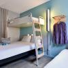 Chambre triple de l'hôtel Ibis Budget Cholet Centre