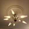 Ce magnifique lustre des années 50 a été déposé, nettoyé et entièrement ré-électrifié avec des ampoules led, avant d'être ré-installé chez la cliente. Effet WOW au centre de la cuisine.