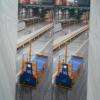 Les robots qui transportent les plaques dans l'usine