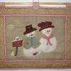 Bonhomme de neige feutrine sur fond lin