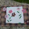 Pochette réalisée en tissus japonais orné de fleurs en feutrine