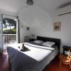 Chambre "la guitare" lit en 1.60 m et balcon vue mer