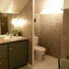 Salle de bain relookée béton ciré