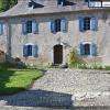 Rénovation à La Prade(65590) :Fenêtres cintrées et volets battants Bois.