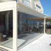 Fermeture de balcon, de terrasse tout en verre, escamotable.