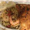 Linguine aux fruits de mer recouvertes d'une croute à pizza
