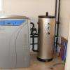 Pompe à chaleur géothermique de 21 kW réversible sur capteur sol eau/eau avec ventilo-convecteur à l'étage et plancher chauffant au RDC