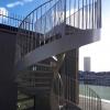 Thermolaquage d'un escalier métallique tournant, avec traitement anticorrosion par PMSI, à Ennery, près de Pontoise, Val d'Oise (95)