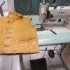réparation de blouson cuir pose de fermeturea glissière redoublage (veste manteaux)