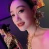 Salon soleil massage paris, Hôtesse en tenue traditionnel thailandaise