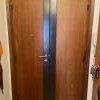 Installation de serrure carénée 7 points avec gâche à répétition sur porte double vantaux 