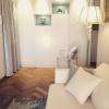 Aménagement d’un séjour classique et chic, création d’un meuble sur mesure