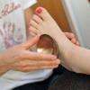 Massage des pieds au bol kansu