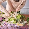 Préparation d'un bouquet de fleurs par Vianney Flora