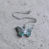 Pendentif en Abalone ou coquille d'ormeau en forme de papillon