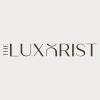 Logo The Luxurist Agence de communication 360° - Graphisme - Sites web - SEO - Supports de com
